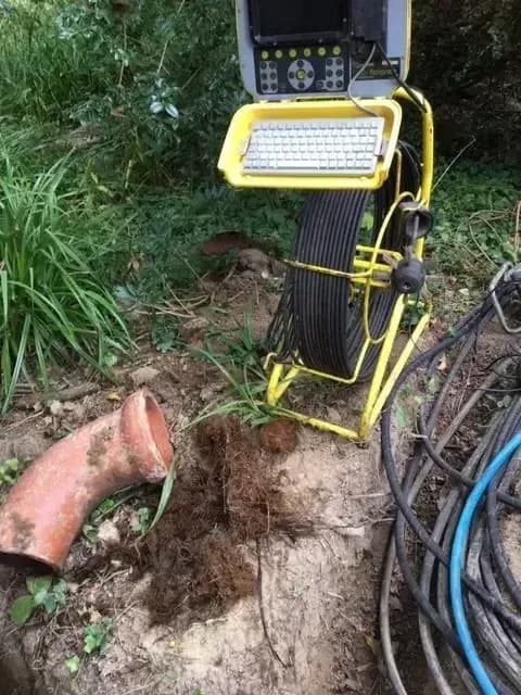 Midhurst, CCTV drain survey monitor and camera reel on a residential job